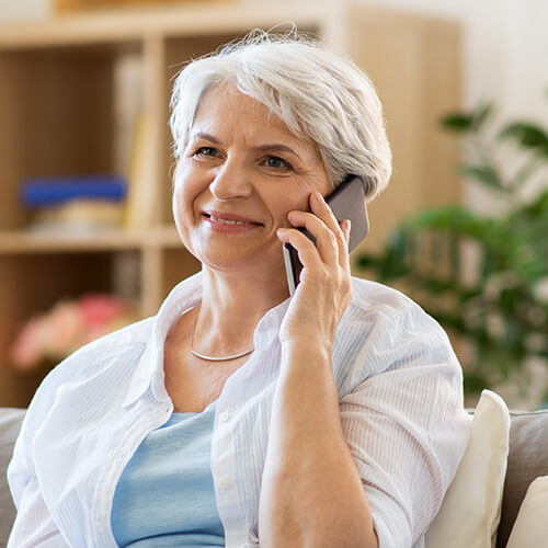 smiling senior woman on phone
